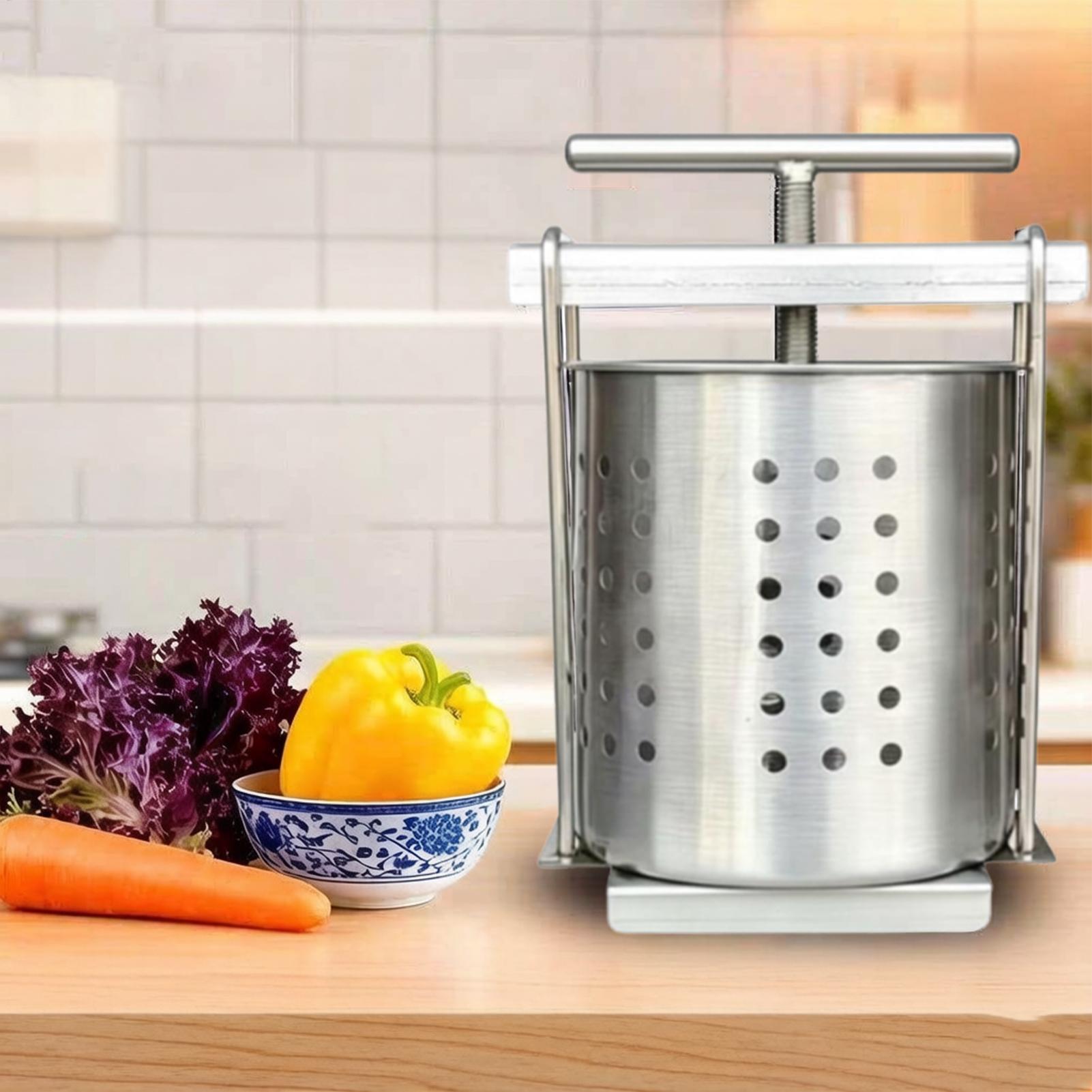عصارة فواكه يدوية من الفولاذ ا - مراجعة Citrus Juicer Bar وسعره