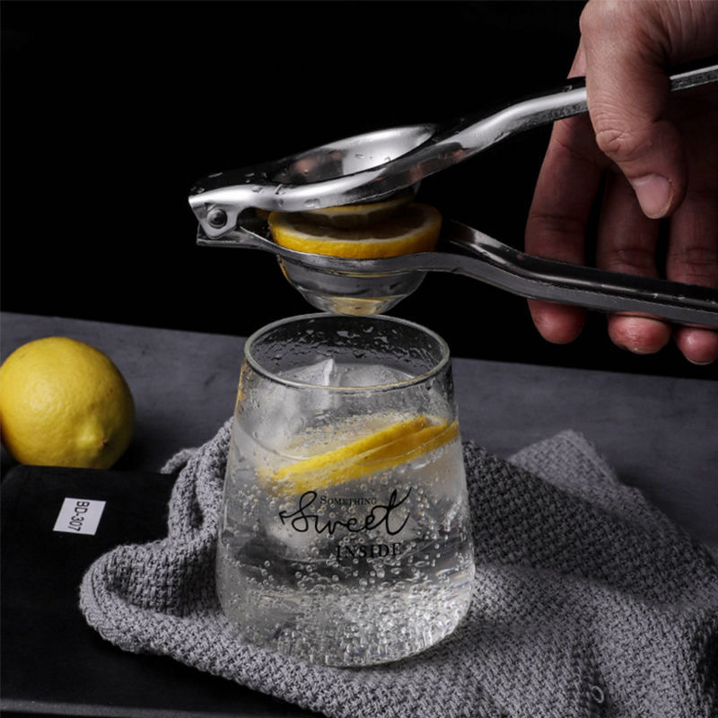 عصارة ليمون يدوية من الفولاذ ا - مراجعة Citrus Juicer Bar وسعره